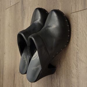 Dansko black heeled mule with rivets